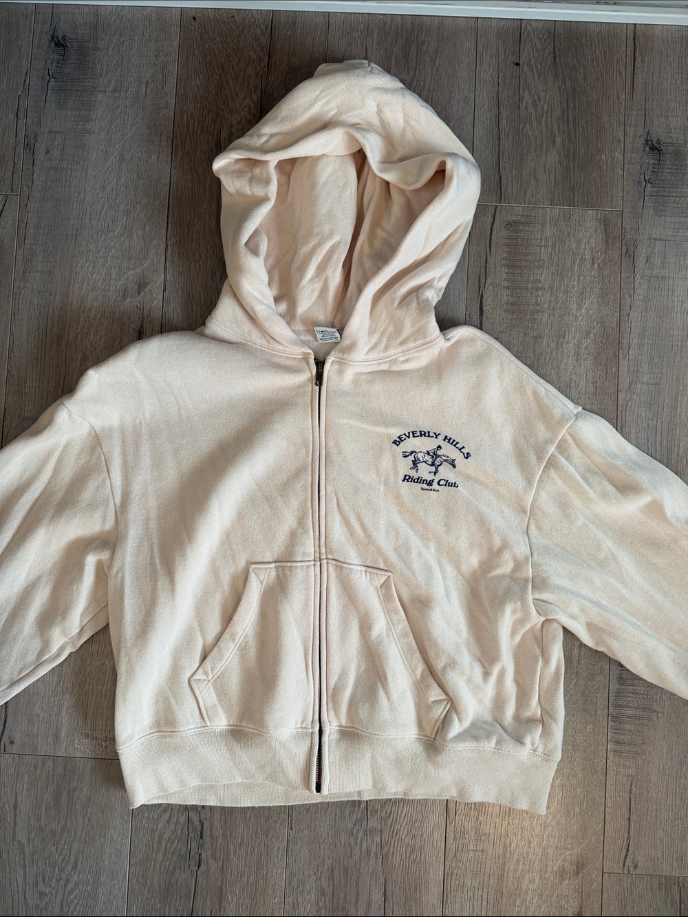 Sporty & Rich Cream Zip Hoodie with Beverly Hills Riding Club Logo